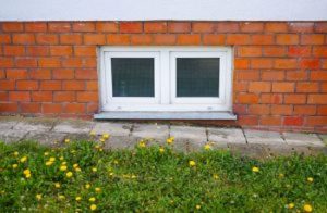 Basement windows don't do the best job at keeping out drafts and moisture, so consider a window well cover for your basement windows! 